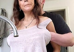 I was doing the dishes but my lascivious spouse didn't let me finish and screwed me from behind in the kitchen
