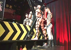 Cock sucking sub is ass hooked and tied