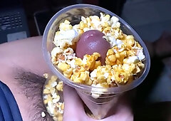 Wank off with popcorn.