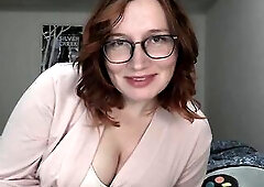 Large titted redhead with glasses is doing her superlatively good to make her lover explode from enjoyment