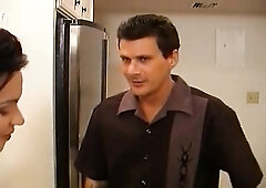 A seductive brunette hair and her partner turn up the heat in the kitchen, beginning with drinks and escalating to intensive twat eating and knob suck