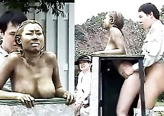 Angel painted like a statue has sex in park.