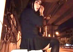 Crossdresser plays with sex toy on the street at night