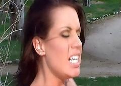 Ashley Fires and Tessa West trade hot cunnilingus outdoors in a lush garden