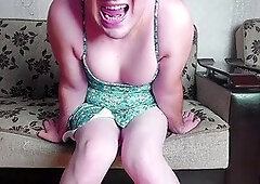 Hot legs and bubble butt of crossdresser model Crossdresserkitty in a short dress