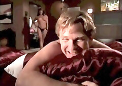 Brunette with big, firm tits is wearing a strap- on and fucking her lover's ass