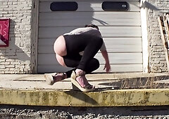 Exhibitionist walks around outdoors in buttless pants