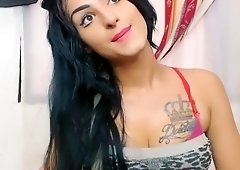 Blackhair Tgirl shows her huge dick