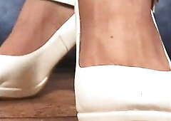 See a Giantess in her White High Heels