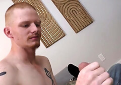 Ginger twink plays with the cock until the cum starts to spill  on his balls