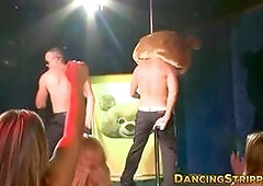 Multiple lusty CFNM chicks take turns giving male strippers blowjobs and being sprayed with cum.