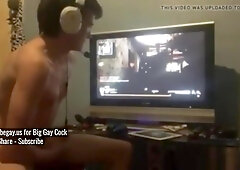 Watch this steamy homemade video of a hot young man pleasuring his manhood on the Gameboy