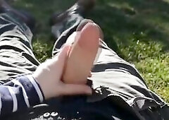 In this explicit amateur video, a European milf takes things to the next level with a sensual handjob in the backyard, culminating in a satisfying cum