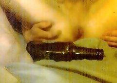 Stretching my ass with a bottle!!