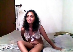 Amusing maid Tina Baby in a sundress gets frisky in the bedroom