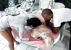 See this experienced woman mummified in taut plastic, her palpitating holes teased throughout the film as the dom couple licks and her with leaking pa