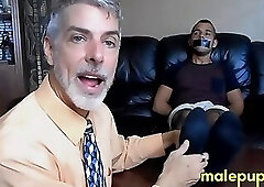 Professor Richard Lennox tickles the exchange student jock Jose Cortezâs feet