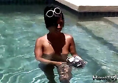 Babe on lilo naked in the sun