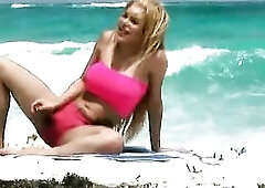 At the beach in pink flashing
