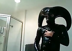 Gay In Latex Suit With Horns Beating Off