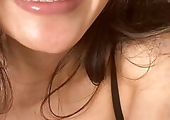 Busty brunette in erotic, black lingerie, Rae Lil Black is posing and teasing on cam