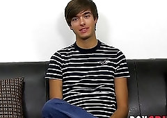 Handsome twink has fun at an interview before jerking off