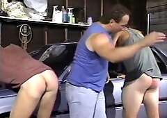 Daddy spanks the boys in the garage