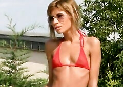 Bikini Enjoyment-Golden-Haired Hotty in red micro Bikini Pool