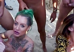 Wild swinger beach fun with a bukkake and lots of facial action