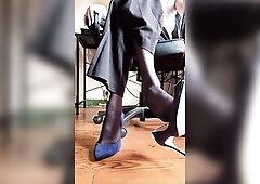 Sissy Claire plays with a sex toy whilst doing a footjob to a sex-toy in stockings !