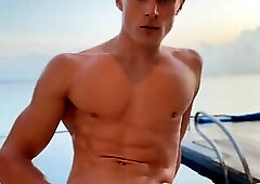 The handsome guy masturbating at the pool