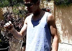 Handsome young jock tugs on his big cock solo outdoor