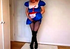 Blue cosplay outfit with latex boots and fishnets