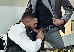 Classy vest and shiny silver blazer combo with two gay guys