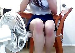 A seductive college bitch plays alone inserting cucumber, bottle, and a syringe of egg into her