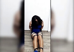 Trans woman in trouble, totally tied and gagged in shiny hose, high heels, and a blue mini-costume. That babe orgasms from the friction...