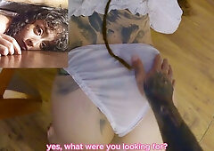 Tattooed brunette in white lingerie receives oral from green-haired man on wooden floor