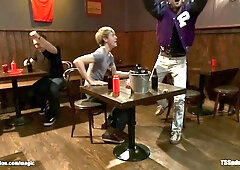 T-girl fucks men in sports bar