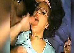 The glasses-wearing doxy lies on her back with throat wide open and tongue out whilst multiple boyz unload thick loads across her face and glasses. Cu
