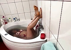 holding my breath underwater whilst i masturbate and make myself cum and squirt then wash my hair and rinse holding my breath underwater afresh