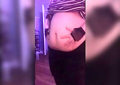 twenty yr old Trans Chap plays with his growing abdomen