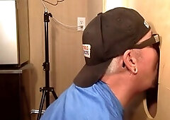 Mature queer at a gloryhole gives a deep blowjob until cumshot