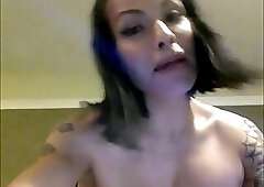 Busty tattooed shecock face fucking a dude