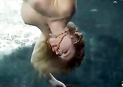 Breasty beauty, Krissy Lynn is rubbing her cunt in the swimming pool, whilst trying to dive