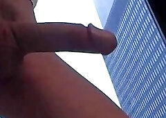 Alluring redhead pulls her big shemale dick for the camera