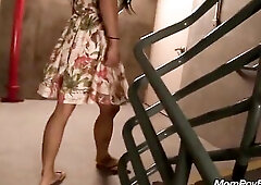 Breasty Oriental mother I'd like to fuck sucks and screws your penis on public stairs