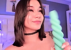 Hot amateur teen girl toying pussy in bed on webcam