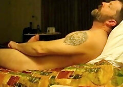 Fur Covered hairy man wanking on couch