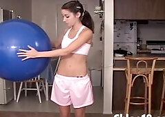 Hot teen gets naked on stability ball then fingers herself