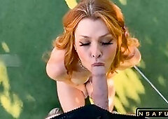 This sexy redhead is not afraid to go after what she wants! She's dressed in a skimpy outfit that shows off her perfect body, and she has her eye